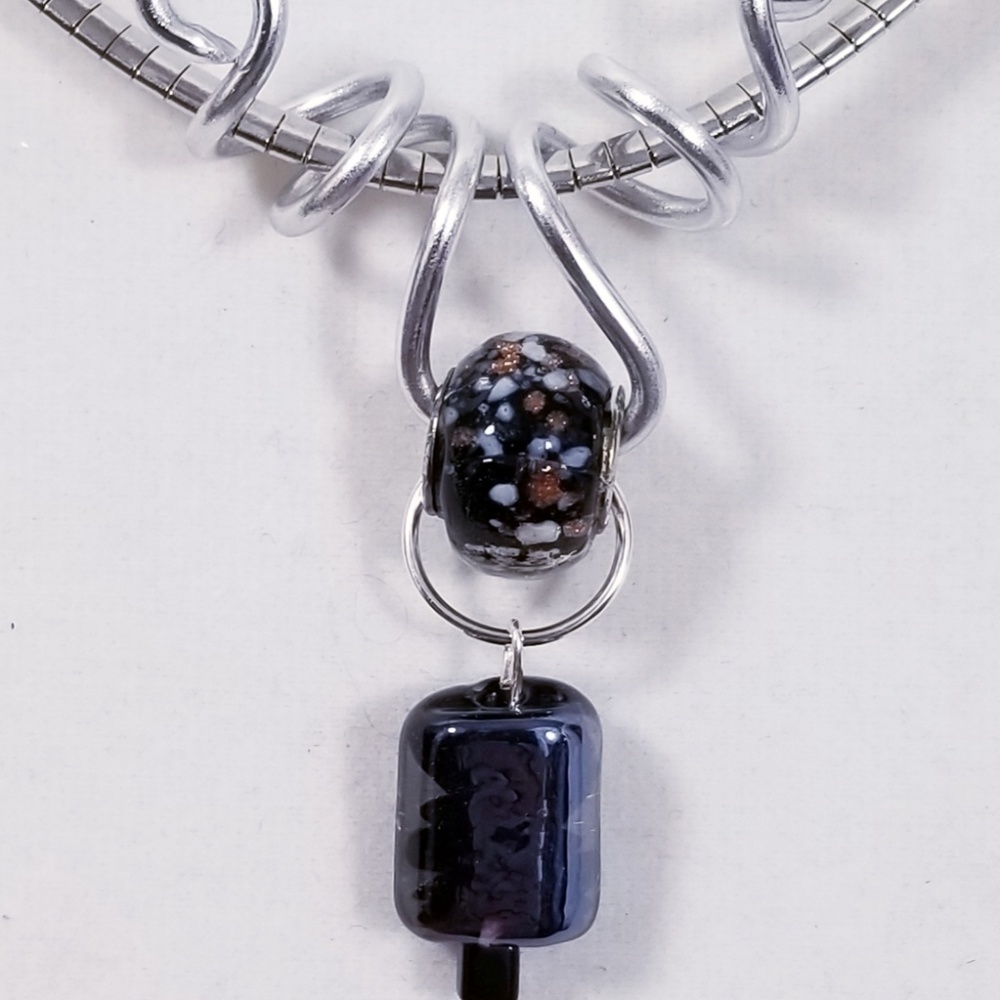 Aluminum Silver Spiral Pendant Black Glass Bead